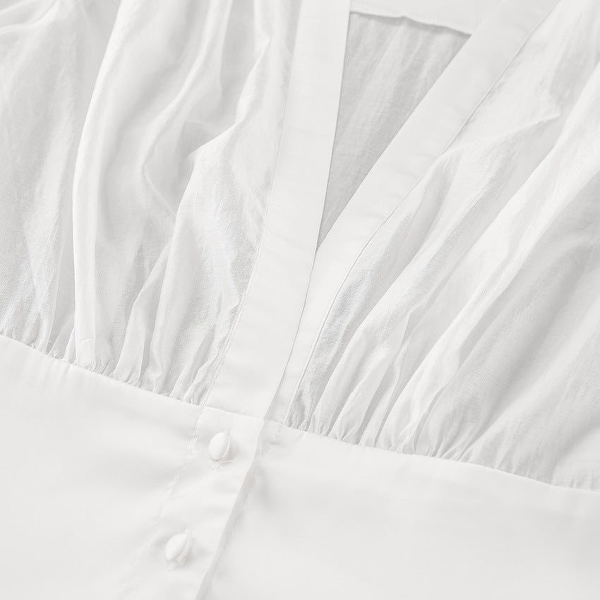 Blouse transparente Lydia à boutons et décolleté profond
