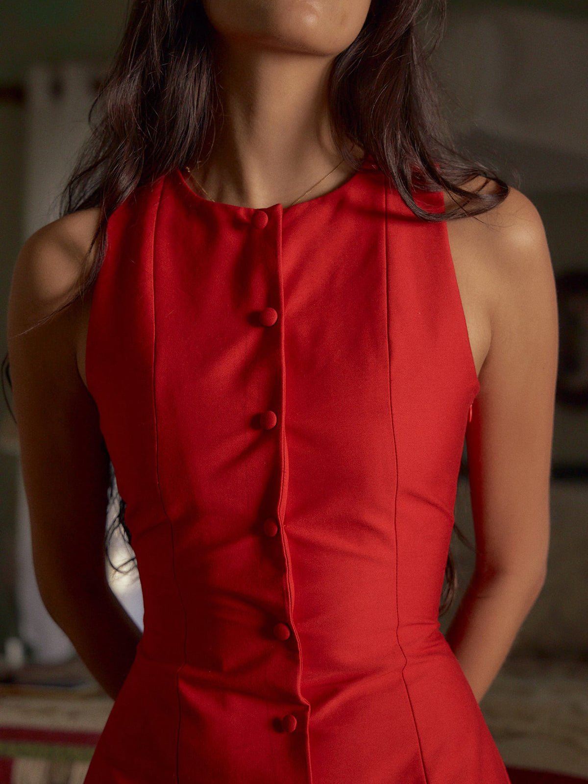 Robe mini sans manches Astra à boutons devant