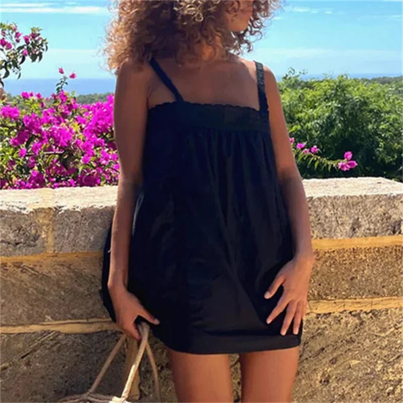 Robe babydoll mini Liora à bordure dentelle