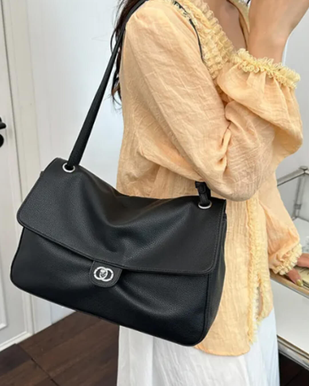 Sac bandoulière Emma à rabat et boucle