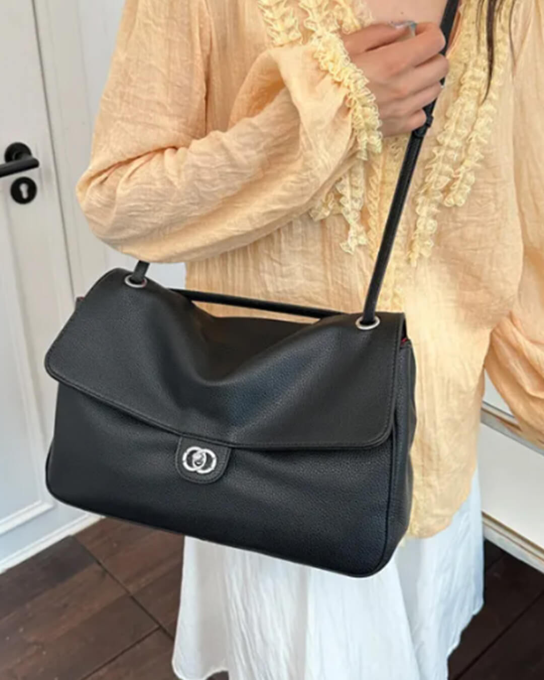 Sac bandoulière Emma à rabat et boucle