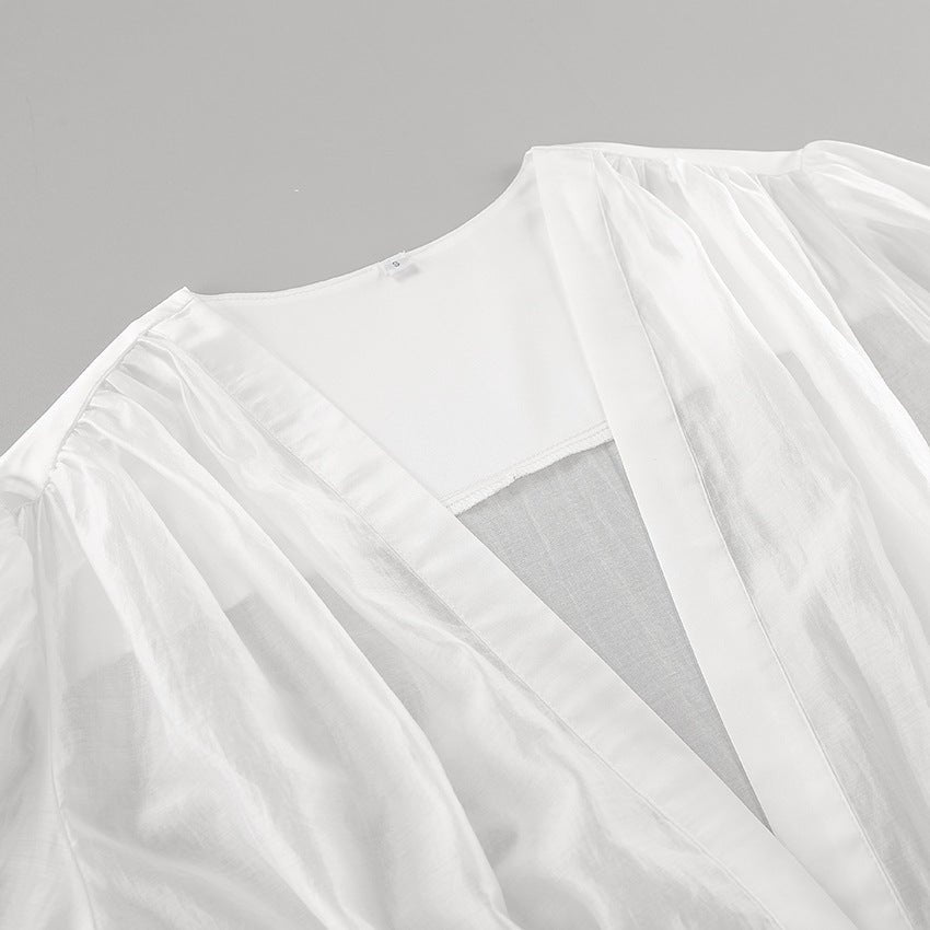 Blouse transparente Lydia à boutons et décolleté profond