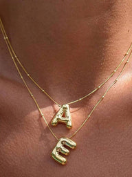 Collier pendentif initial Eveline